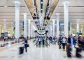 Dubai International Airport is rolling out AI-powered hand-luggage scanners in 2026 that will let passengers keep liquids and laptops in their bags, improving security efficiency and convenience.