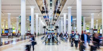 Dubai International Airport is rolling out AI-powered hand-luggage scanners in 2026 that will let passengers keep liquids and laptops in their bags, improving security efficiency and convenience.