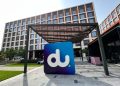 du headquarters Dubai telecom company annual meeting dividend announcement