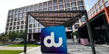 du headquarters Dubai telecom company annual meeting dividend announcement