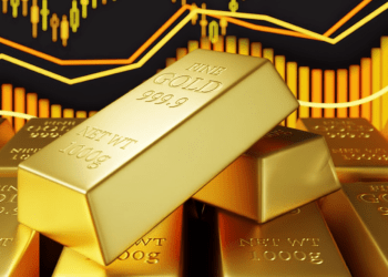 Gold Prices Retreat Below Two-Week High Ahead of Crucial Fed Minutes